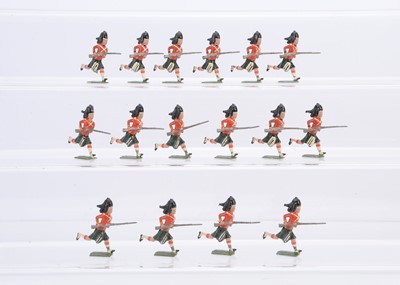 Lot 648 - Britains charging Highlanders comprising rare non-moustached version of pre WW2 only set 15 Argyll and Sutherland Highlanders with post WW2 set 11 The Black Watch