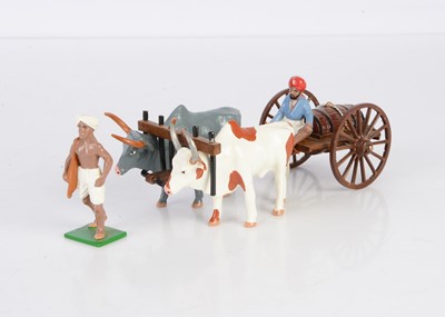 Lot 667 - Trophy Miniatures Oxen pulling water cart with seated driver and water seller