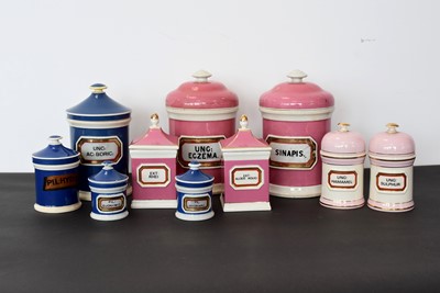 Lot 122 - An assortment of Pharmaceutical Lidded containers