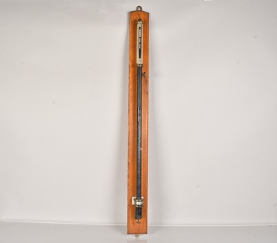 Lot 251 - A vintage stick barometer by Becker