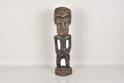 Lot 299 - A carved African figure of a Male