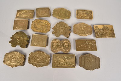 Lot 365 - A collection of brass belt buckles by Deane & Adams