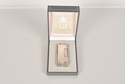 Lot 403 - A silver plated Dunhill Rollagass Pocket Lighter