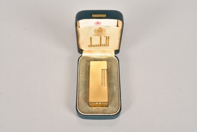 Lot 404 - A gold plated Dunhill Rollagass Pocket Lighter