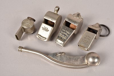 Lot 594 - A group of five whistles