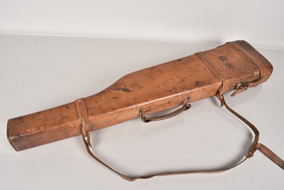 Lot 606 - A brown hard leather gun case