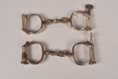 Lot 630 - Two pairs of Hiatt Handcuffs/Restraints