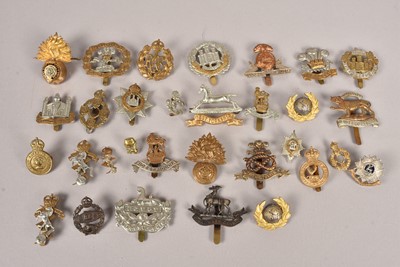 Lot 649 - A collection of British Cap badges