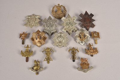 Lot 651 - A collection of British Cap badges