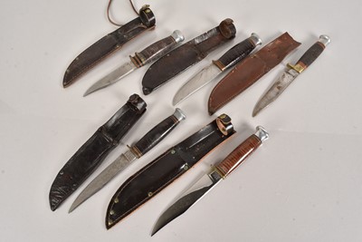 Lot 822 - A collection of five Hunting knives