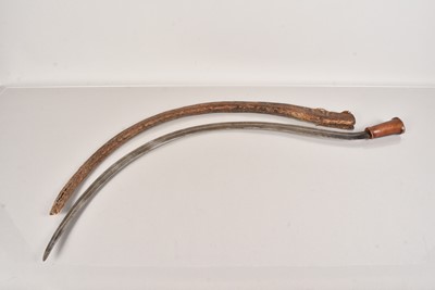 Lot 884 - A Middle Eastern Sickle