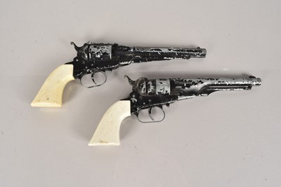 Lot 908 - A pair of Remington Streamline Cap guns