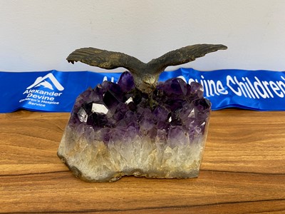 Lot 8 - A metalware eagle on an amethyst base