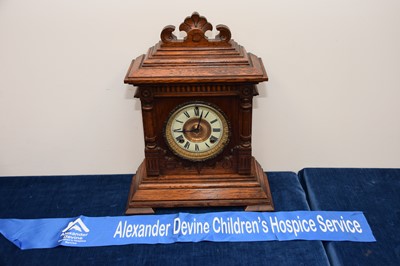 Lot 12 - A late Victorian oak cased eight day mantle clock