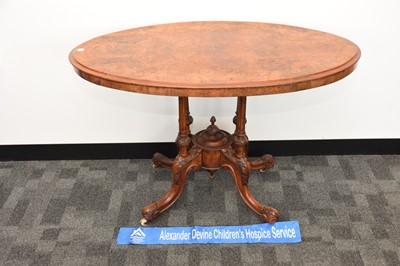 Lot 42 - A Victorian walnut veneered and inlaid occasional table