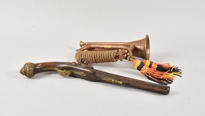 Lot 75 - A reproduction percussion cap pistol and a copper bugle