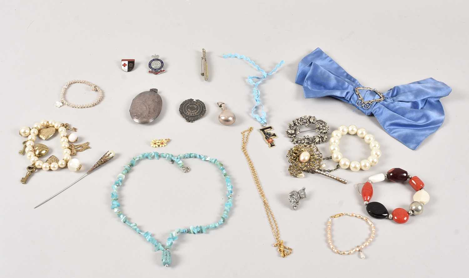 83 - A small group of jewellery and other items,