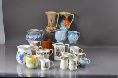 Lot 102 - A collection of pottery, bone china and porcelain jugs