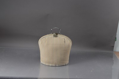 Lot 105 - A Vintage cloth and chrome plated tea cosy