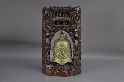 Lot 156 - A Chinese brass bell or gong with a dragon chasing a flaming pearl