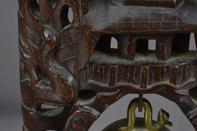 Lot 156 - A Chinese brass bell or gong with a dragon chasing a flaming pearl