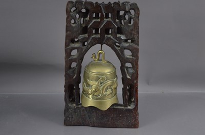 Lot 156 - A Chinese brass bell or gong with a dragon chasing a flaming pearl
