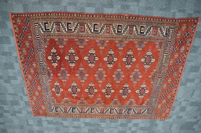 Lot 183 - A red ground Oriental Turkaman rug