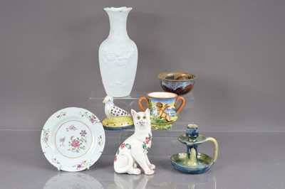 Lot 244 - A Wemyss style pottery cat with glass eyes