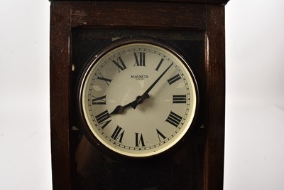 Lot 287 - A large Magneta oak cased Electric wall clock