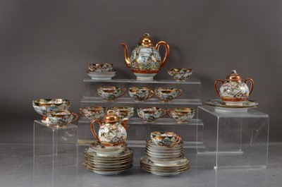 Lot 304 - A Japanese eggshell tea set