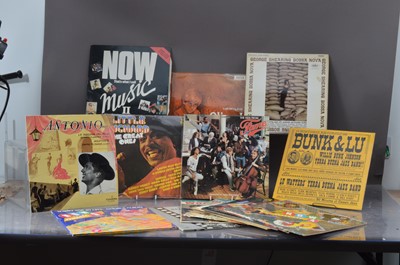 Lot 306 - Two vinyl album boxes each containing various albums and 12'' singles