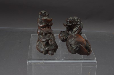 Lot 349 - 4 Japanese box wood carved netsuke, including a pig standing with a bowl with bird and flower, 3 tortoise and a dragon.