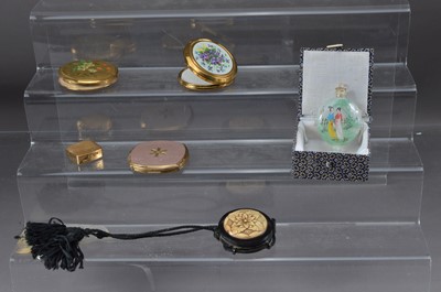 Lot 355 - Four ladies' compacts