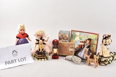 Lot 400 - A collection of Doll parts and souvenir dolls and other items