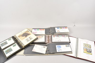 Lot 424 - 3 albums of first day covers, together with 2 stamp albums