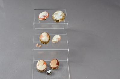 Lot 457 - A selection of shell and other cameo broaches, along with one pair of cameo earings.