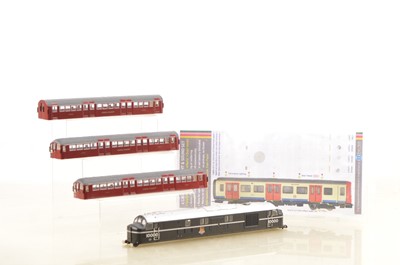 Lot 403 - 00 Gauge EFE underground coach bodies with lighting and Bachmann 10000 BR black Diesel Body and Train Tech lighting Units (5)