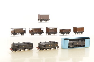 Lot 445 - Three Hornby-Dublo 00 Gauge 3-Rail EDL17 LMS black 6917 0-6-2T Engines and various Trucks (9)