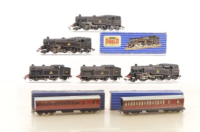 Lot 451 - Hornby-Dublo 00 Gauge 3-Rail BR black Tank Locomotives and Suburban Coaches (4)