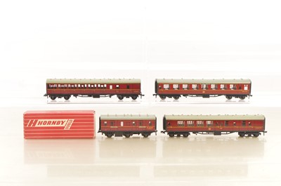 Lot 484 - Hornby-Dublo 00 Gauge 2-Rail Sper Detail late issue 4076 Six-wheeled 'Stove' Passenger Brake Van and unboxed Super Detail maroon Coaches (4)