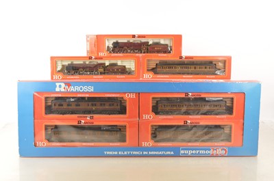 Lot 598 - Rivarossi pair of HO Gauge LMS Royal Scot Locomotivers and five maroon Coaches (7, in four boxes)