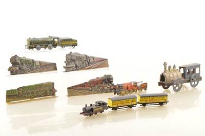 Lot 603 - Collection of Penny type toy Trains Modern Boys Comic tinplate Train embossed 'flats'  Steam Locomotives and Shredded Wheat N Gauge Train (11)