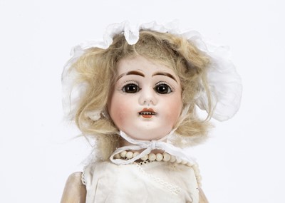 Lot 66 - A late 19th Century German bisque headed doll with impressed 3