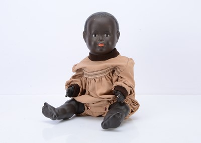 Lot 147 - A Hugo Wiegand black composition character baby