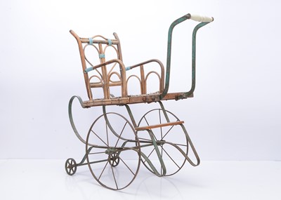 Lot 175 - A 1920-30s bamboo and wrought iron doll's push chair