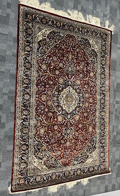 Lot 376 - A modern Middle Eastern silk carpet