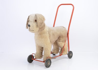 Lot 202 - A post-war Lines Bros Ltd pull ride on soft toy dog