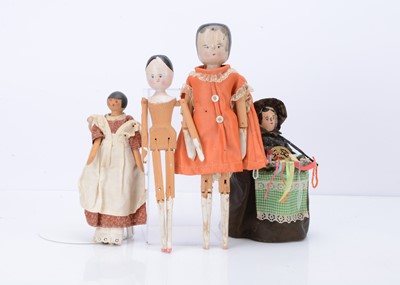 Lot 218 - Two German pegged wooden dolls