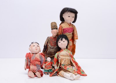 Lot 229 - Five Asian dolls