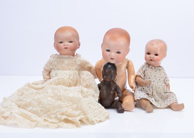 Lot 235 - Four baby dolls